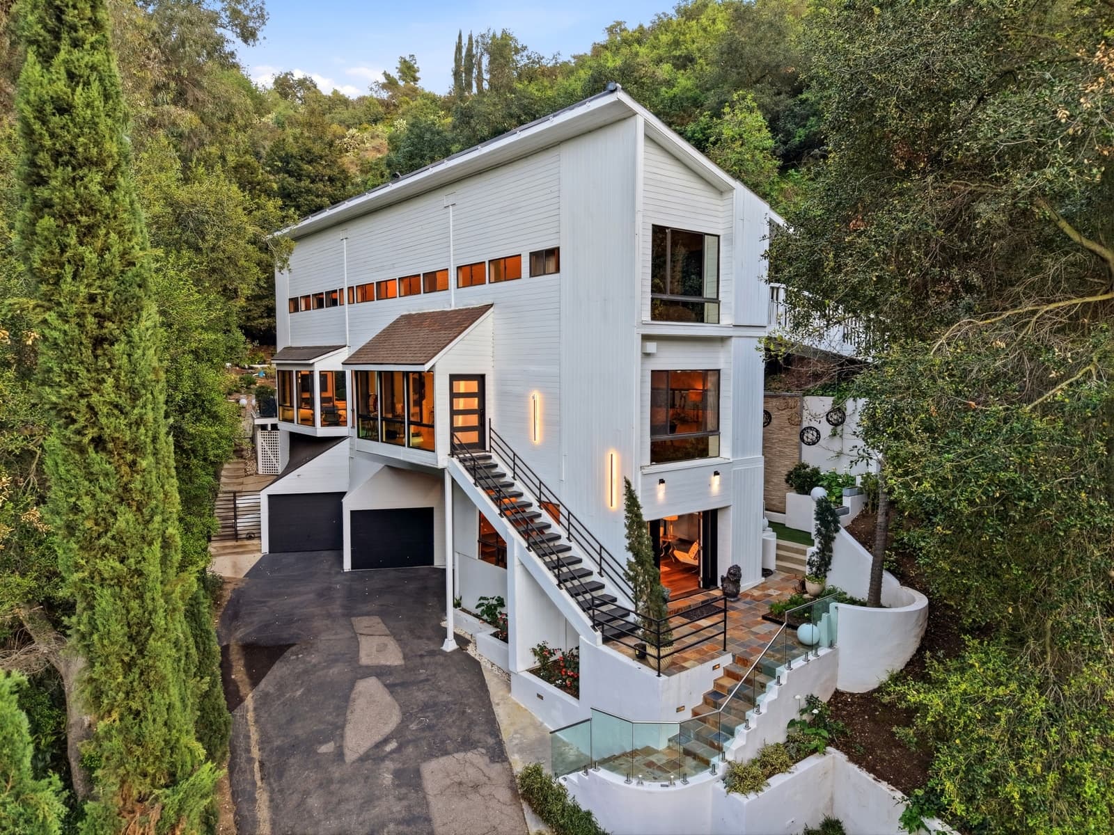 Twilight exterior of a Beverly Hills estate on Benedict Canyon Drive