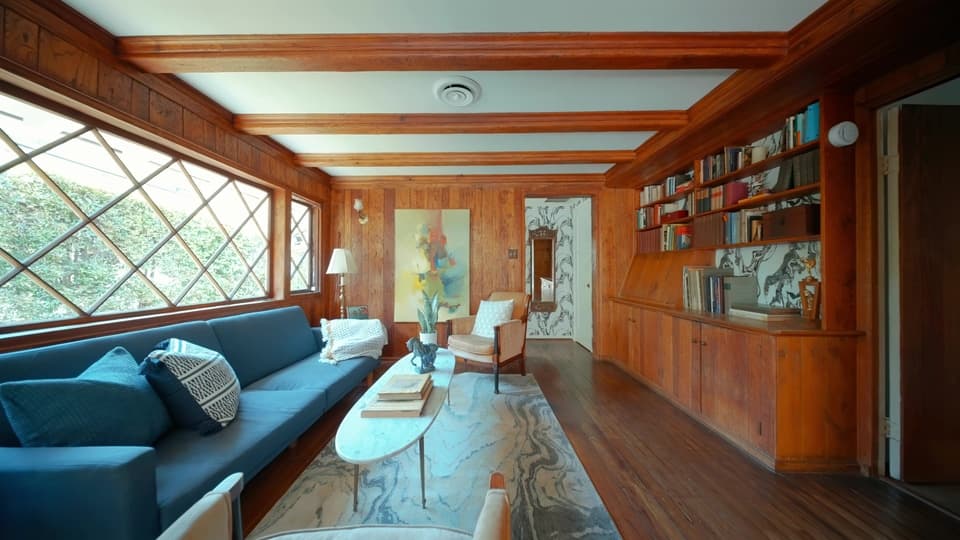 Wood-panelled living room and library at 947 N Beverly Glen Blvd