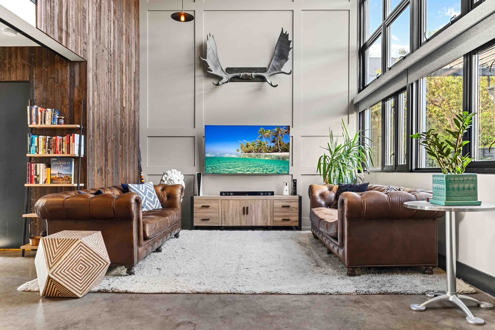 Double-height living room from a VVT listing shoot