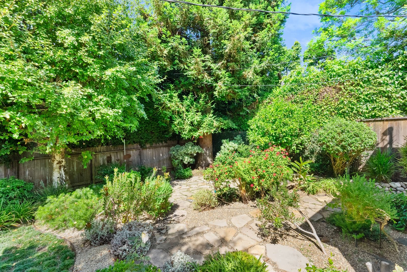 Garden pathway in a Pacific Palisades listing, photographed by VVT