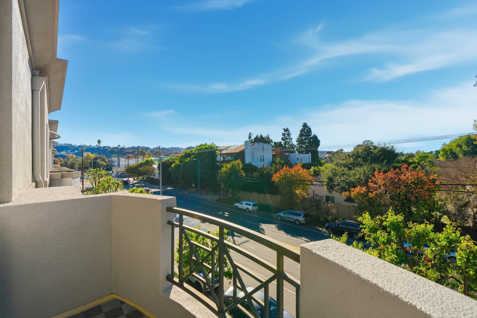 Balcony view over the hillside from a Studio City condo, photographed by VVT