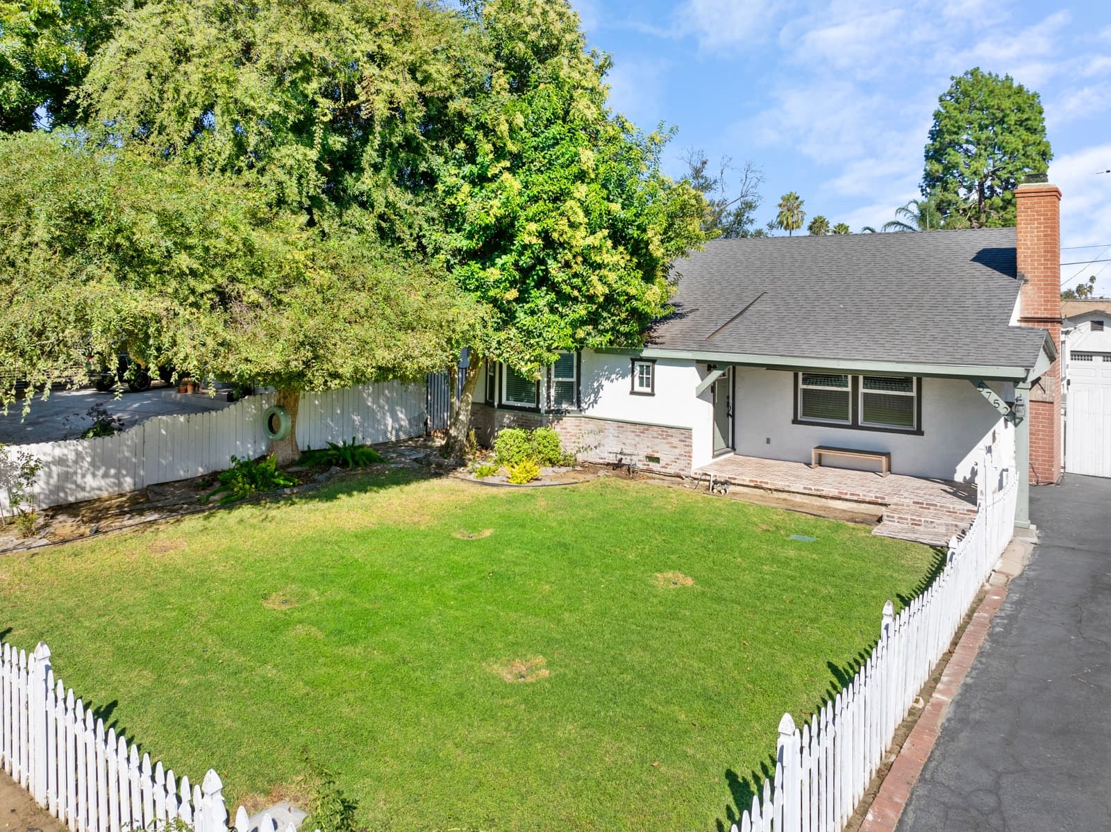 Aerial view of a Van Nuys ranch home and lot