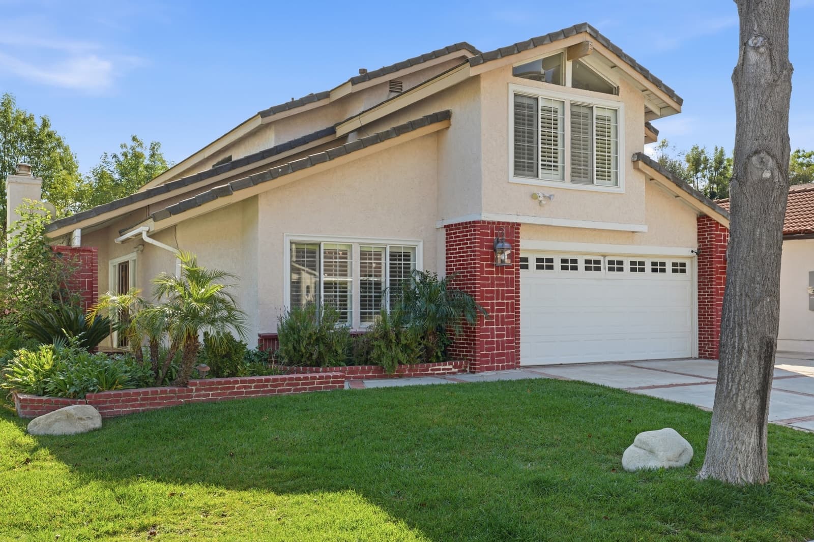 Two-story suburban home exterior in West Hills